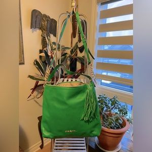 Michael Kors green leather purse with gold chain detail and tassel